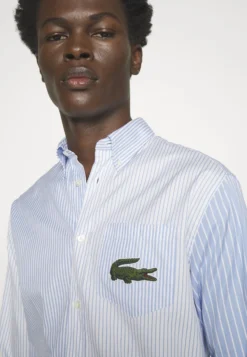 Lacoste Unisex - Overhemd - White/Hellblau -Lacoste 08a249d69bc844e3bd0744e3f5c1fe1e scaled