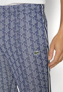 Lacoste Monogram Trackpant - Trainingsbroek - Methylene/Flour -Lacoste 121b9cb977d24e3ca69c8e9a3ab4a67f scaled