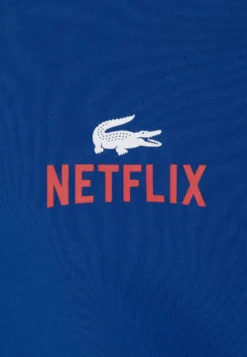 Lacoste X Netflix Unisex - Sweater - Cobalt -Lacoste 2081c92c3b854a028eddd1801c1b723c scaled
