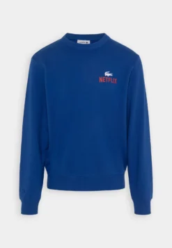 Lacoste X Netflix Unisex - Sweater - Cobalt -Lacoste 4b11c5d64c864ddba8523fea5161fc7d scaled