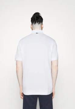 Lacoste X Netflix - Poloshirt - White 8 Lacoste X Netflix - Poloshirt - White -Lacoste 640a8250c88a4dee866774c187fbbcb4 scaled