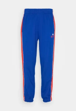 Lacoste X Netflix Unisex - Trainingsbroek - Cobalt -Lacoste 6d7d1527a6b449929e4ce0ee46e9d8af scaled