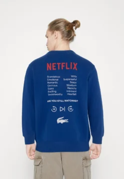 Lacoste X Netflix Unisex - Sweater - Cobalt -Lacoste 84546b666d2a42fc9df3ce3af65af0ea scaled