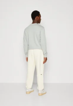 Lacoste Unisex - Trainingsbroek - Lapland -Lacoste b56ff01f53824eb4a5ad6375239afac4 scaled